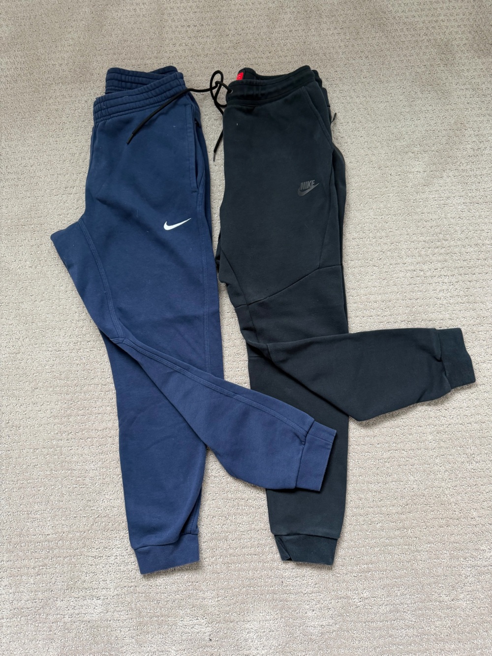Nike man’s Navy & Black Joggers with White Swoosh